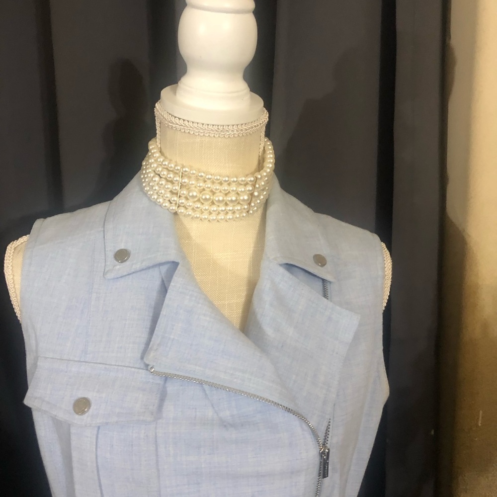 Calvin Klein. Never worn. From shoulder 39 inches